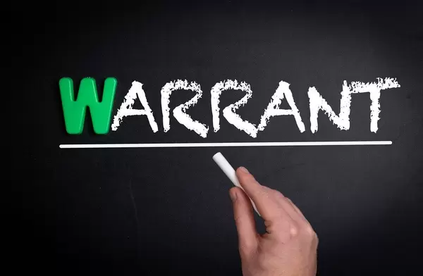 Warrant text on blackboard