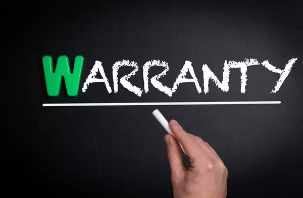 Warranty text on blackboard