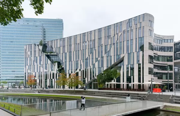 Water canal in front of modern Kö Bogen shopping mall