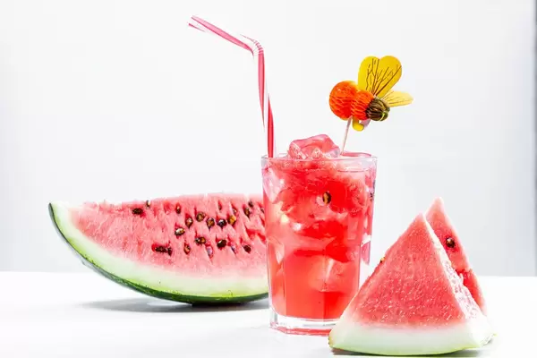 Watermelon drink in glass with slices of watermelon (Flip 2019)