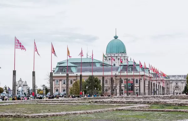 Waving flags in front ob Buda Castle in Budapest