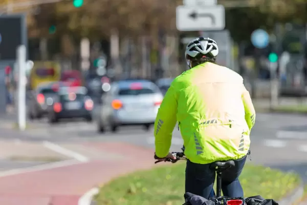 Wearing a reflective vest while cycling