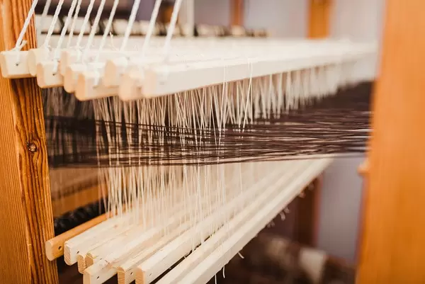 Weaving Loom Background With Close Up Yarn