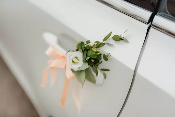 Wedding Car Decorated With White Rose