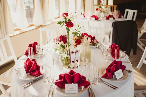 Wedding Table Serving Indoors With Red Roses