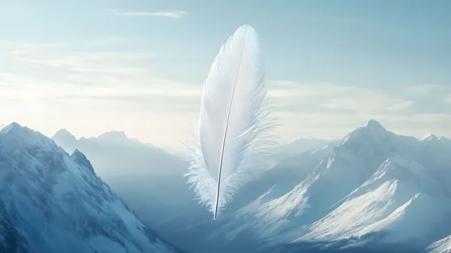 Weiße Feder vor majestätischer Bergkulisse