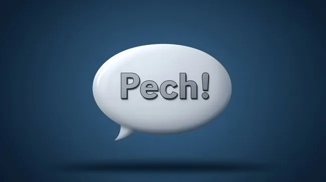 Weiße Sprechblase mit dem Wort 'Pech!' auf dunklem Hintergrund