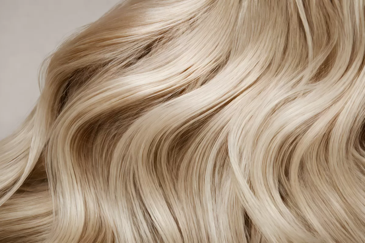 Welliger, blonder Frisur-Hintergrund