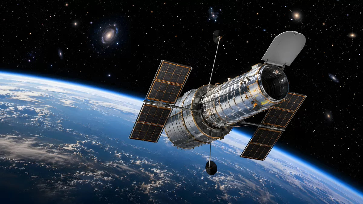 Weltraumteleskop schwebt über der Erde im All