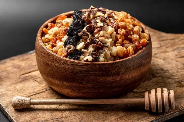 Wheat porridge with raisins, poppy seeds, walnuts and honey