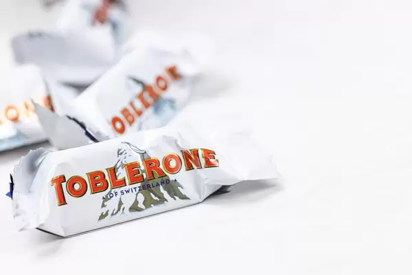 White Chocolate Toblerone with copy space above white background
