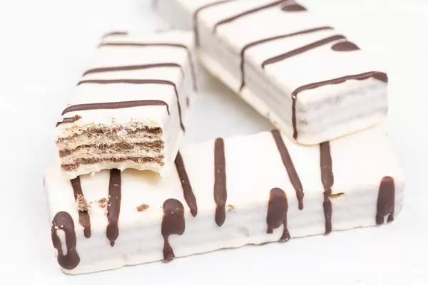 White Chocolate Wafers on the white table background