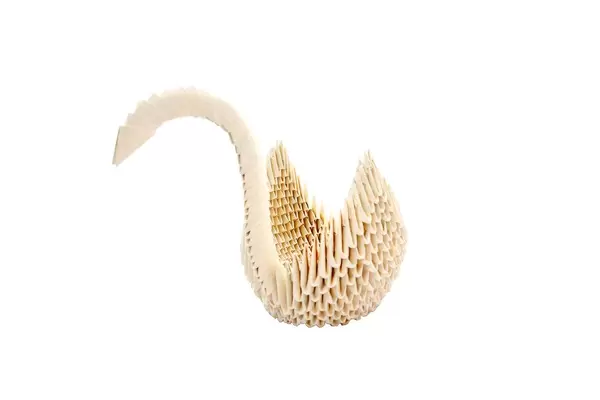 White origami swan isolated on white background (Flip 2019)