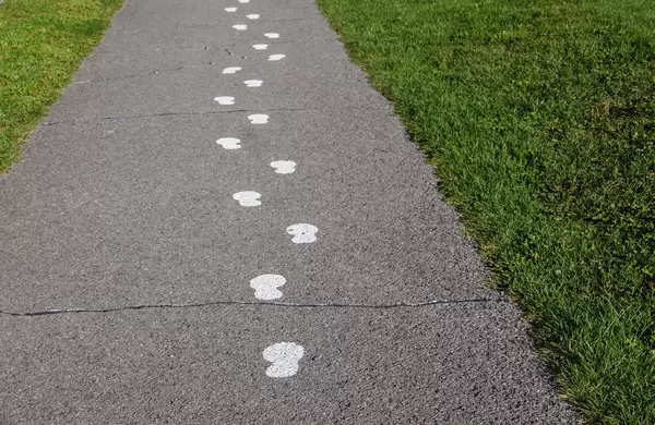 White Paint Footsteps in the Street