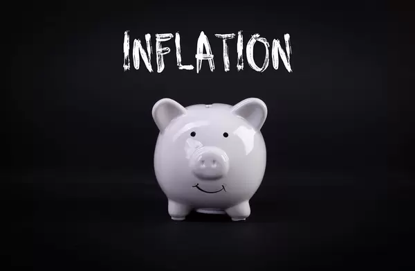 White piggybank with Inflation text