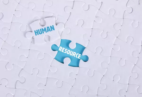 White puzzle with word Human & Resource