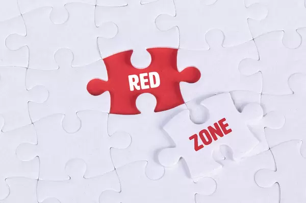 White puzzle with word Red & Zone