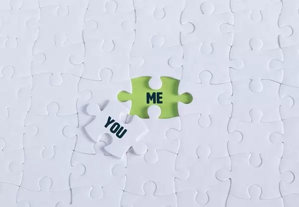 White puzzle with word You & Me