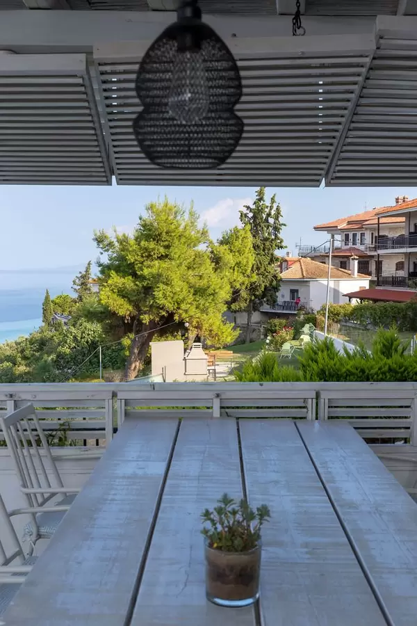 White terrace in a restaurant in Afitos