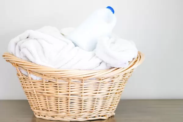 White Towels in Laundry Basket