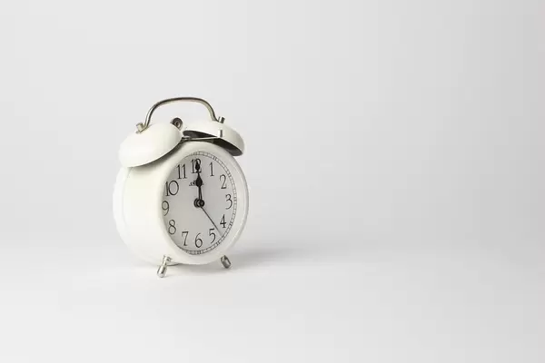 White Vintage Timer Clock showing Midnight Time on White Background