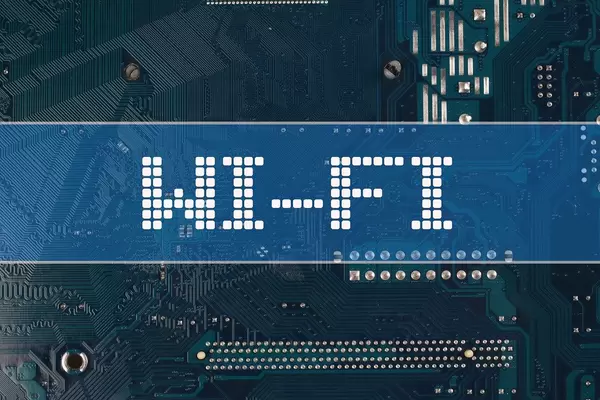 WI-FI text over electronic circuit board background