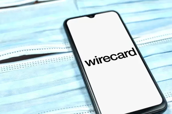 Wirecard – digital financial commerce platform for innovative digital payments. Company logo on smartphone display. Changing global business rules