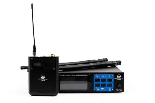 Wireless Receiver and Transmitter for Vocal Microphone above white background