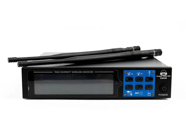 Wireless Receiver for Vocal Microphone above white background