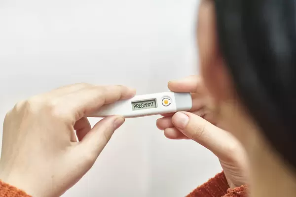 Woman checking pregnancy