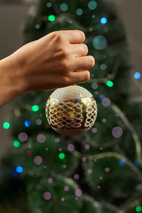 Woman holding christmas decoration