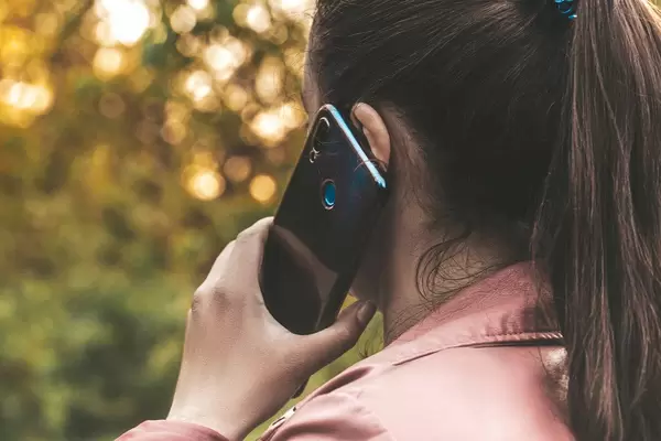 Woman talking on her mobile phone on outdoor