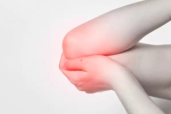 Woman with elbow pain