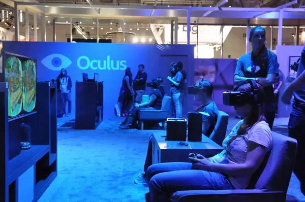 Woman with oculus rift virtual reality headset, playing VR-games
