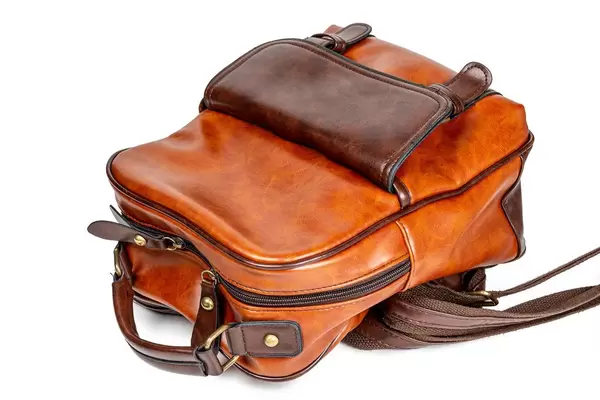 Women's vintage brown backpack on white