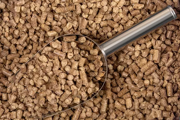 Wood litter for animal toilet close-up, background