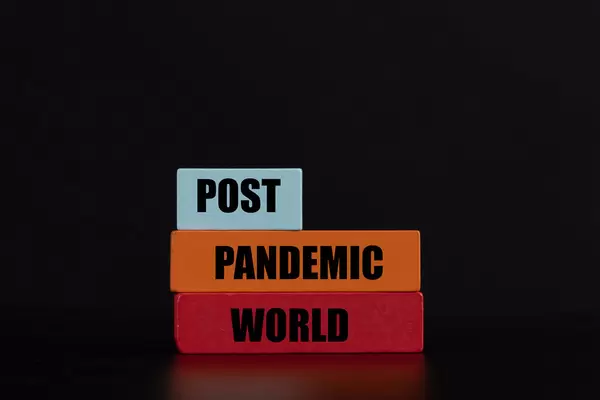 Wooden blocks with Post Pandemic World text