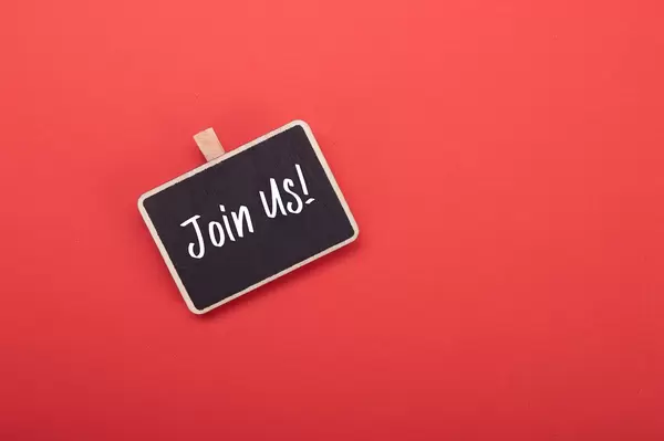 Wooden clip with Join Us! text on red background