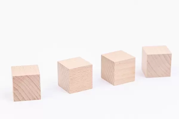 Wooden Cubes isolated above white background with copy space