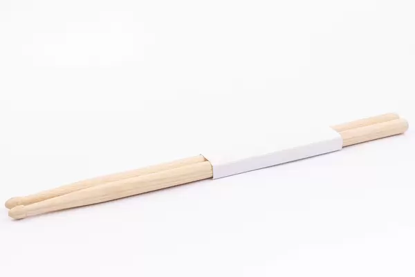 Wooden Drumsticks isolated above white background