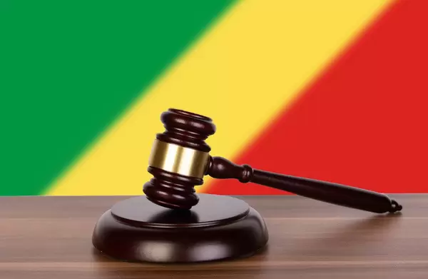 Wooden gavel and flag of Democratic Republic of the Congo