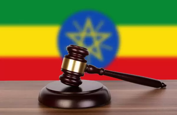 Wooden gavel and flag of Etiopia