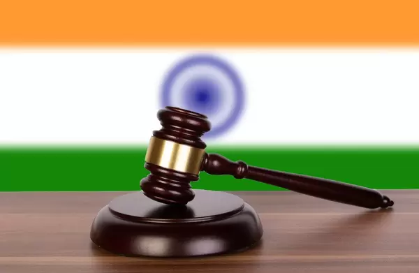 Wooden gavel and flag of India