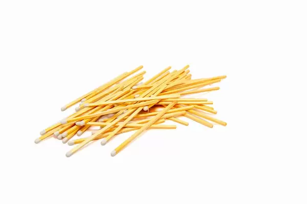 Wooden matches on white background