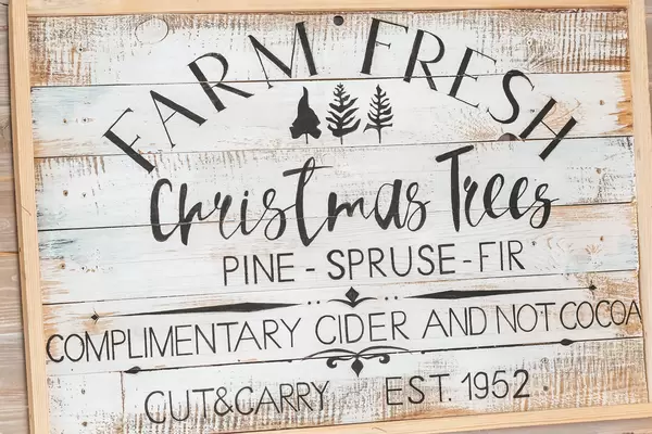 Wooden signboard farm fresh christmas trees