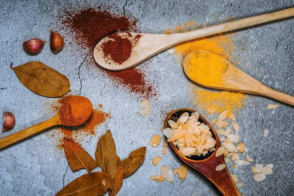 Wooden spoons with spices. (Flip 2019)