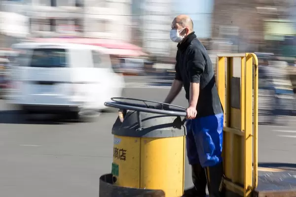 Worker on Tsukiji Market with electronical vehicle