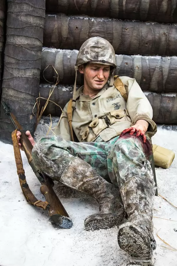 Wounded Marine Behind a Trench