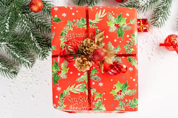 Wrapped red gift box for christmas or new years
