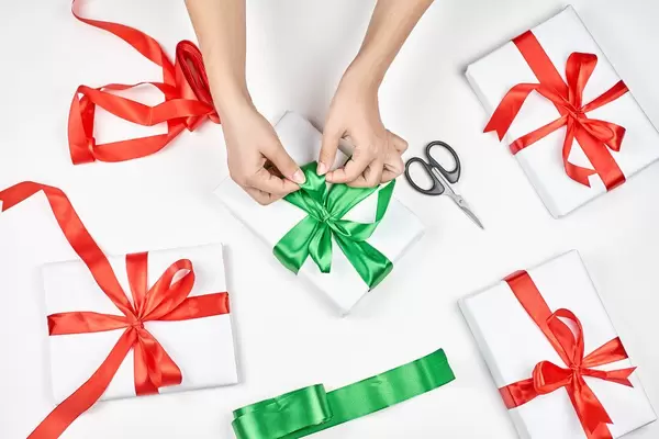 Wrapping presents for Christmas at home